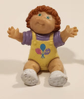 Vintage 1984 OAA Cabbage Patch Kids Baby Girl in Yellow Overalls with Balloons 1 3/4" PVC Toy Figure