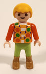 1992 Geobra Playmobil Blonde Haired Boy Green Pants Orange Top 2" Tall Toy Figure