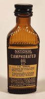 Rare Vintage National Drug And Chemical Company of Canada Limited Montreal Canada Camphorated Oil B. P. 2 Fl. Ounces Brown Amber Glass Bottle Near Full