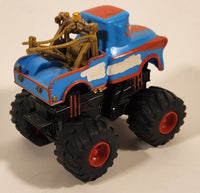 2005 Disney Pixar Cars Toon Deluxe The Tormentor Monster Tow Truck Blue and Red 4 1/4" Die Cast Toy Car Vehicle