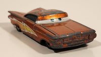 Disney Pixar Cars Chevrolet Impala Lightning Ramone Metallic Red Orange Die Cast Toy Car Vehicle