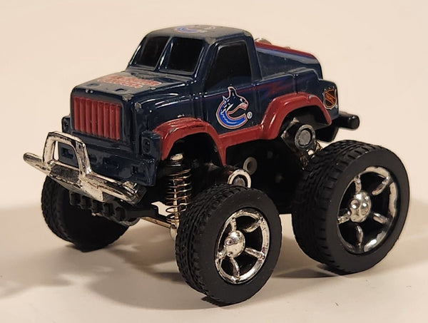 Fleer Collectible NHL Vancouver Canucks Ice Hockey Team Lifted 1997 Ford Truck Dark Blue and Red Pull Back Die Cast Toy Car Vehicle