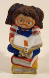 1984 OAA Panosh Place Cabbage Patch Kids Brown Hair with Pigtails Sitting On Books Reading A Book 2 1/2" Tall PVC Toy Figure