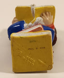 1984 OAA Panosh Place Cabbage Patch Kids Brown Hair with Pigtails Sitting On Books Reading A Book 2 1/2" Tall PVC Toy Figure