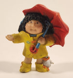 Vintage 1984 OAA Cabbage Patch Kids Girl in Yellow Rain Coat Holding Red Umbrella 2 5/8" PVC Toy Figure
