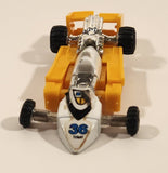 Vintage 1984 Tonka Bandai Go-Bots Slicks F1 Formula 1 #36 Yellow and White 4 1/4" Transforming Toy Car Action Figure