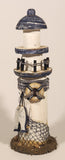 White and Blue Lighthouse with Fish and Fishing Nets Hanging 8 1/2" Wood Ornament