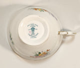 Vintage Crown Fine Bone China Staffordshire England Mixed Flower Pattern Blue and White Gold Trim Tea Cup Saucer