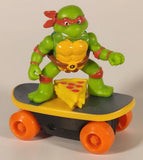 2023 Viacom TMNT Teenage Mutant Ninja Turtles Switch Kick Skaters Raphael on Skateboard with Pizza 3" Toy Figure