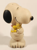 Vintage 1958, 1965, 1966, 1972 Danara International United Features Syndicate Peanuts Snoopy Holding Woodstock 5 1/2" Squeaky Rubber Toy Figure
