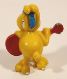 Vintage 1989 Grimmy Dog Aid Yellow Dog with Red Guitar 2 1/2" PVC Toy Figure