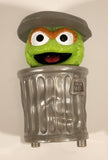 Sesame Street Oscar The Grouch in Garbage Can Pop Up Plastic Toy Figure