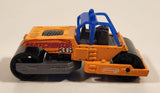 2000 Matchbox Earth Crunchers Road Roller Fluorescent Orange Die Cast Toy Construction Vehicle
