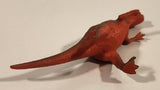 S.H. Orange and Green Raptor 2 3/4" Tall Dinosaur Toy Figure