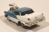Muscle Machines 1956 Oldsmobile 88 Turquoise and White Die Cast Toy Car Vehicle