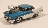 Muscle Machines 1956 Oldsmobile 88 Turquoise and White Die Cast Toy Car Vehicle