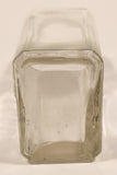 Vintage Kuowow's Powder Heavy Embossed Glass Bottle