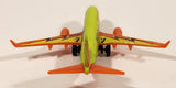 2007 Matchbox Boeing 737-800 Bolt Airways Airplane Fluorescent Yellow and Orange Die Cast Toy Aircraft