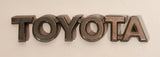 Toyota Plastic Metal Look Emblem Nameplate Badge Logo OEM