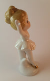 Vintage Porcelain Ceramic Ballerina with Gold Slippers and Hair Bow - Treasure Valley Antiques & Collectibles