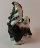 Vintage Porcelain Skunk Figurine with Tongue Out - Treasure Valley Antiques & Collectibles