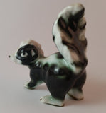 Vintage Porcelain Skunk Figurine with Tongue Out - Treasure Valley Antiques & Collectibles