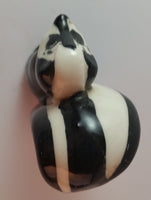 Vintage Dark Eyed Porcelain Skunk Figurine - Treasure Valley Antiques & Collectibles