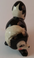 Vintage Porcelain Ceramic Playful Skunk Figurine - Treasure Valley Antiques & Collectibles