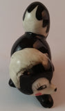 Vintage Porcelain Ceramic Playful Skunk Figurine - Treasure Valley Antiques & Collectibles