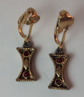 Vintage Ruby Red Rhinestone Gold Tone Clip On Earrings Not Signed - Treasure Valley Antiques & Collectibles