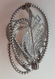 Vintage Silver Tone Opera Twist Style Brooch - Treasure Valley Antiques & Collectibles