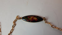 Vintage Floral on Black Enamel Oval Gold Tone Necklace - Treasure Valley Antiques & Collectibles