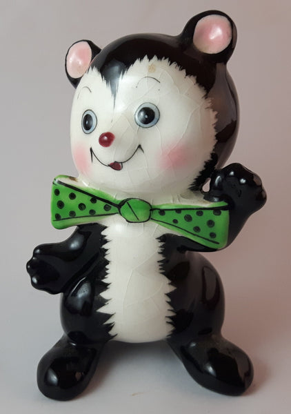 1950s Blushing Skunk with Green Polka Dot Bow Tie - Treasure Valley Antiques & Collectibles