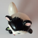 1950s Blushing Skunk with Green Polka Dot Bow Tie - Treasure Valley Antiques & Collectibles