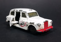1985-1986 Matchbox Mattel Coca-Cola Coke Taxi FX4R with Suicide Doors Diecast Toy Car - Treasure Valley Antiques & Collectibles