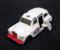 1985-1986 Matchbox Mattel Coca-Cola Coke Taxi FX4R with Suicide Doors Diecast Toy Car - Treasure Valley Antiques & Collectibles
