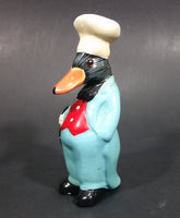 Vintage Black Duck in a Blue Suit Chef Cook Figurine Holding a Bottle of Bubbly - Treasure Valley Antiques & Collectibles