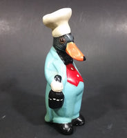 Vintage Black Duck in a Blue Suit Chef Cook Figurine Holding a Bottle of Bubbly - Treasure Valley Antiques & Collectibles