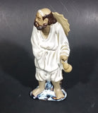 Vintage Balding Man with a Beard in a White Robe With a Tan Hat Ceramic Figurine - Treasure Valley Antiques & Collectibles