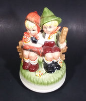 Vintage Hummel Style Bavarian German Boy and Girl Ceramic Rotating Music Box - Treasure Valley Antiques & Collectibles