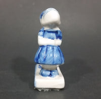 Vintage Delft Blue Holland Dutch Boy and Girl Kissing Hand Painted Ceramic Figurine - Treasure Valley Antiques & Collectibles
