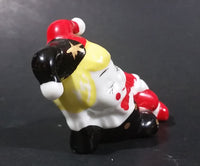 Decorative Ceramic Jester Laying Down Sleeping Dreaming Figurine w/ Red & Black Costume - Treasure Valley Antiques & Collectibles