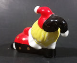 Decorative Ceramic Jester Laying Down Sleeping Dreaming Figurine w/ Red & Black Costume - Treasure Valley Antiques & Collectibles