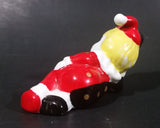 Decorative Ceramic Jester Laying Down Sleeping Dreaming Figurine w/ Red & Black Costume - Treasure Valley Antiques & Collectibles