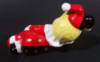 Decorative Ceramic Jester Laying Down Sleeping Dreaming Figurine w/ Red & Black Costume - Treasure Valley Antiques & Collectibles