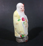 Vintage Chinese God Shou Wiseman in a Yellow Robe with Red Staff holding Fruit Ceramic Figurine - Treasure Valley Antiques & Collectibles