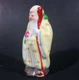 Vintage Chinese God Shou Wiseman in a Yellow Robe with Red Staff holding Fruit Ceramic Figurine - Treasure Valley Antiques & Collectibles