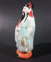 Vintage Chinese Wiseman in a Light Blue Robe with Red Item in Hand Figurine - Treasure Valley Antiques & Collectibles