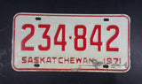1971 Saskatchewan White with Red Letters Vehicle License Plate 234 842 - Treasure Valley Antiques & Collectibles
