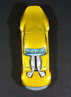 2007 Hot Wheels Nitro Door Slammer Aston Martin Metalflake Gold Die Cast Toy Race Car - Treasure Valley Antiques & Collectibles